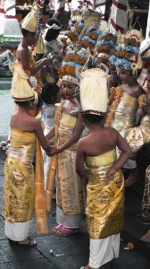 Bali Girls Playing before a Performance. Hand Tinted Photograph