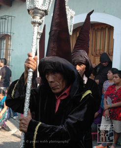 Devotion, this man has been apart of the processions during Easter since he was a little boy.